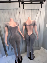 Look at her jumpsuit