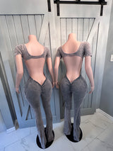 Look at her jumpsuit